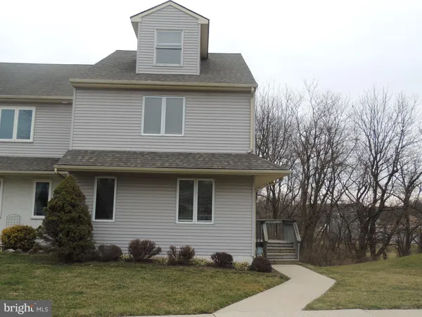 a view of a house with a deck