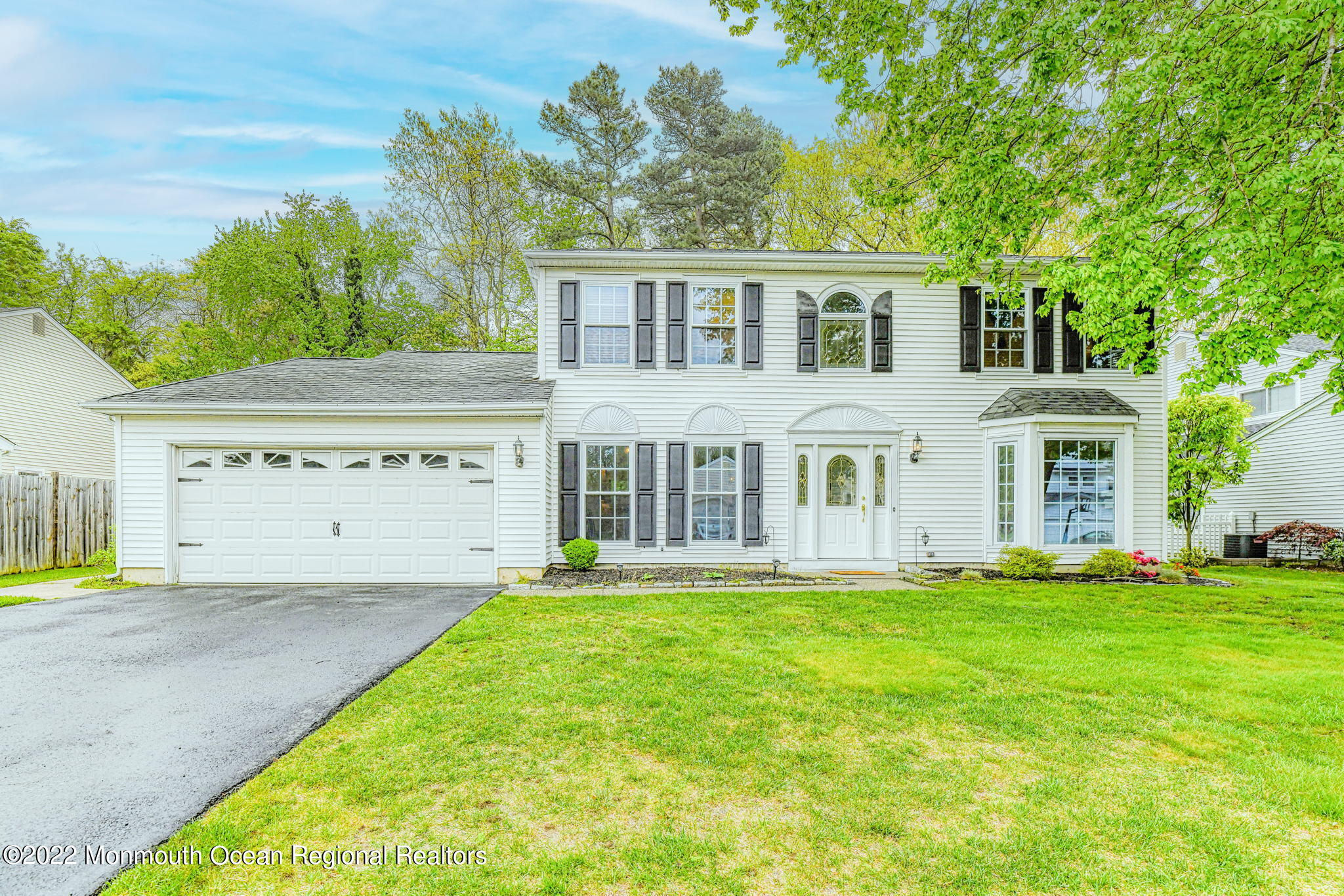 9 Sweet Gum Road Howell, NJ 07731 - Photo 3 of 38 a view of a house with a yard and pathway