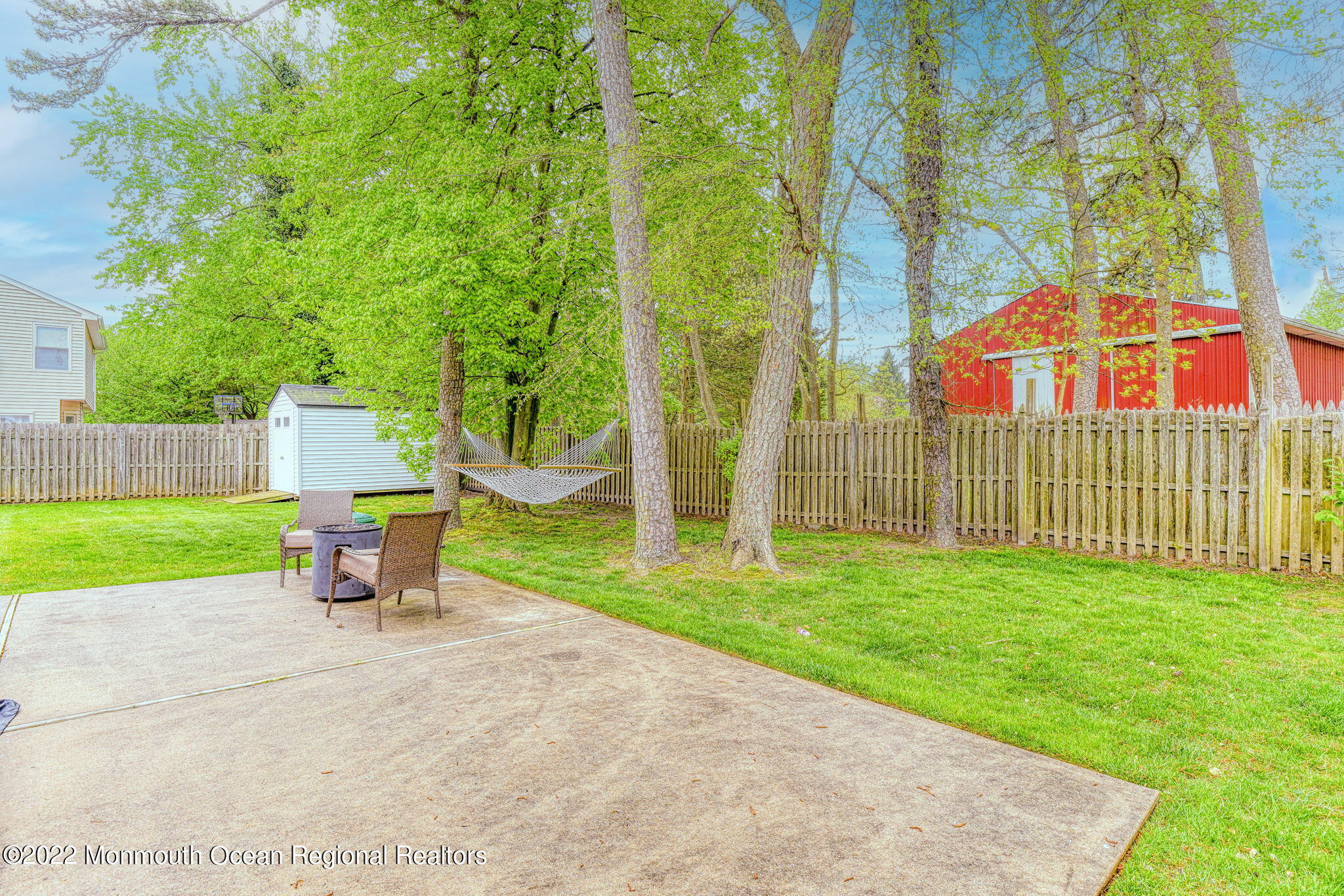 9 Sweet Gum Road Howell, NJ 07731 - Photo 36 of 38 a view of a bench in the garden