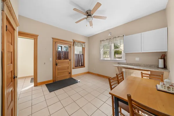 a view of an empty room with a fireplace