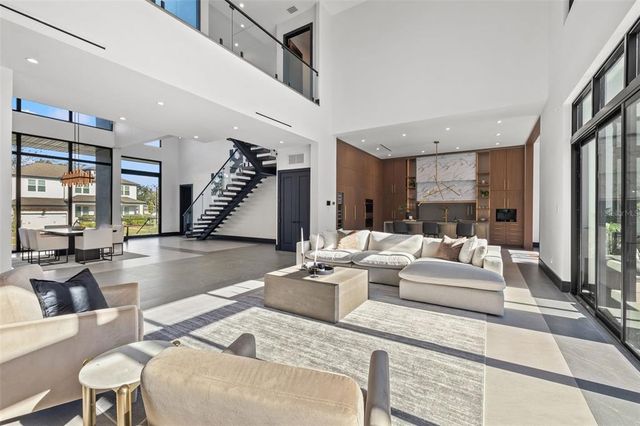 a large kitchen with a large window