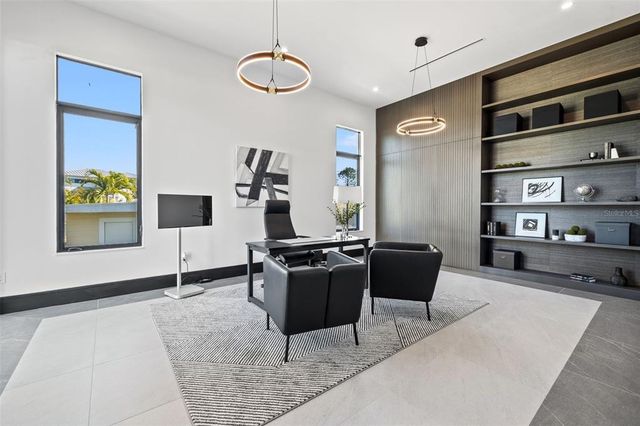a spacious bathroom with a double vanity sink a mirror and a bathtub