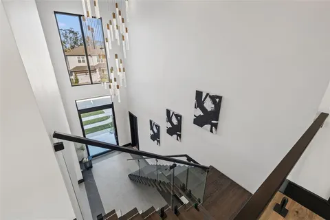 a view of a livingroom with a ceiling fan and window