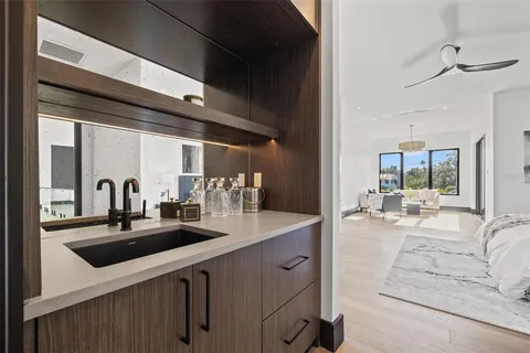 a view of a patio with couches and potted plants