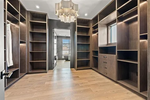 a view of a living room with a table and chair