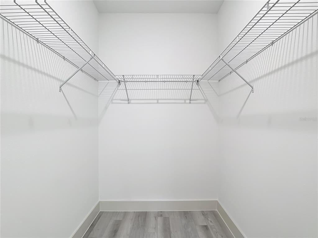 3525 Southwest 163rd Pl Road Ocala, FL 34473 - Photo 24 of 80 a view of a room with racks on the wall