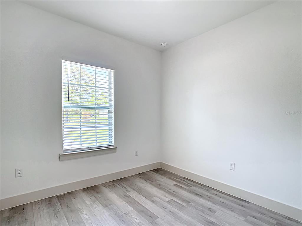 3525 Southwest 163rd Pl Road Ocala, FL 34473 - Photo 34 of 80 an empty room with a window
