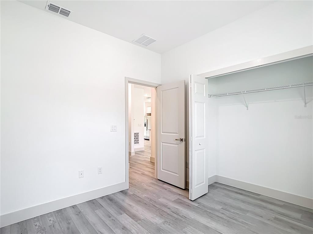 3525 Southwest 163rd Pl Road Ocala, FL 34473 - Photo 36 of 80 an empty room with wooden floor