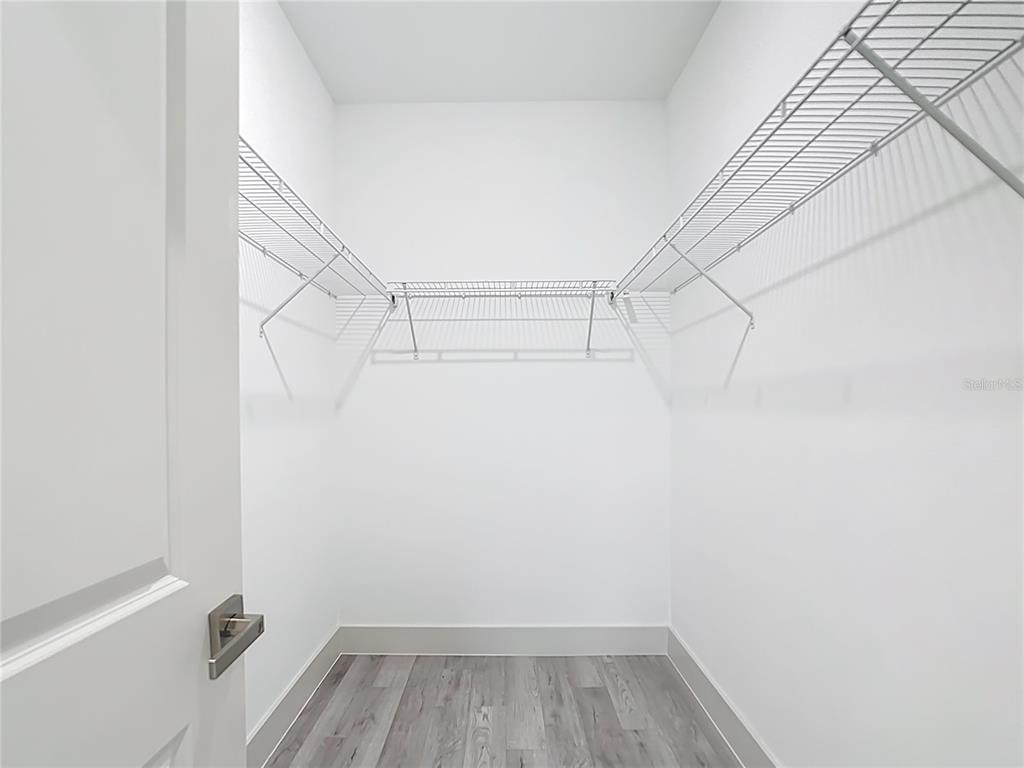 3525 Southwest 163rd Pl Road Ocala, FL 34473 - Photo 50 of 80 a view of a room with racks on the wall