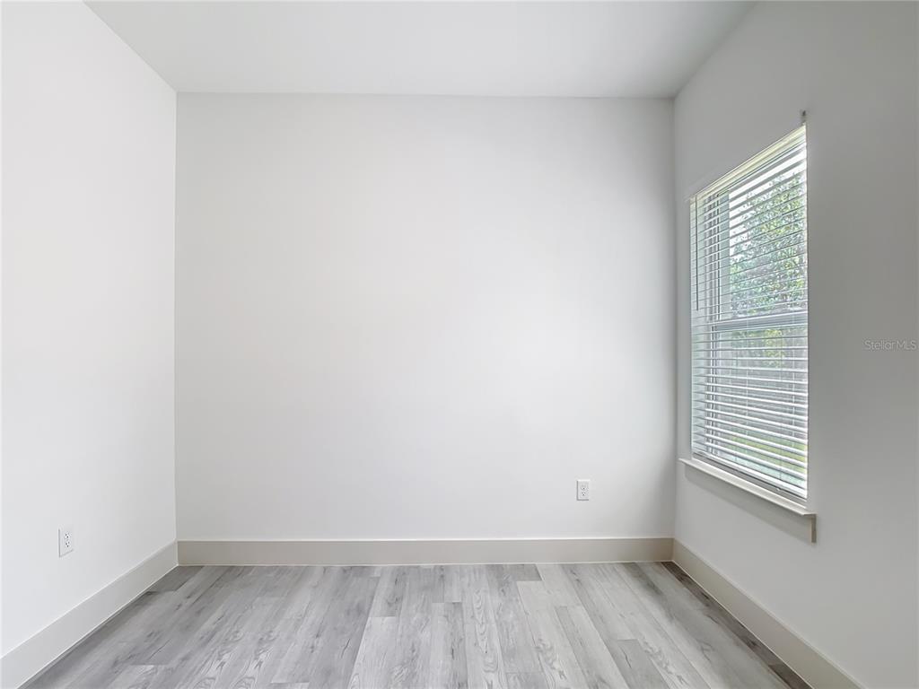 3525 Southwest 163rd Pl Road Ocala, FL 34473 - Photo 59 of 80 a view of an empty room with a window