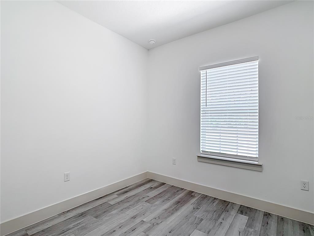 3525 Southwest 163rd Pl Road Ocala, FL 34473 - Photo 60 of 80 an empty room with a window