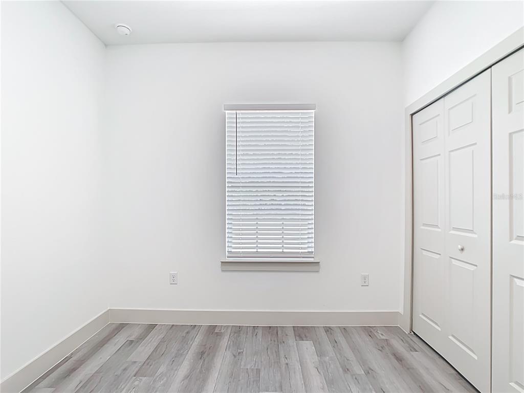 3525 Southwest 163rd Pl Road Ocala, FL 34473 - Photo 61 of 80 an empty room with a window