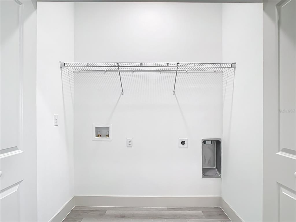 3525 Southwest 163rd Pl Road Ocala, FL 34473 - Photo 66 of 80 a view of walk in closet with empty racks