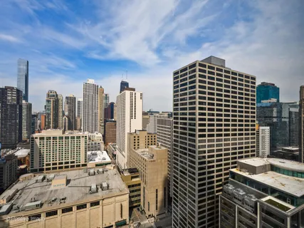 a view of a city with tall buildings