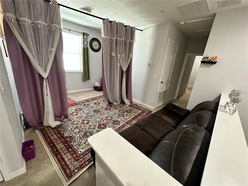 250 Rustic Loop Sanford, FL 32771 - Photo 15 of 33 a living room with furniture