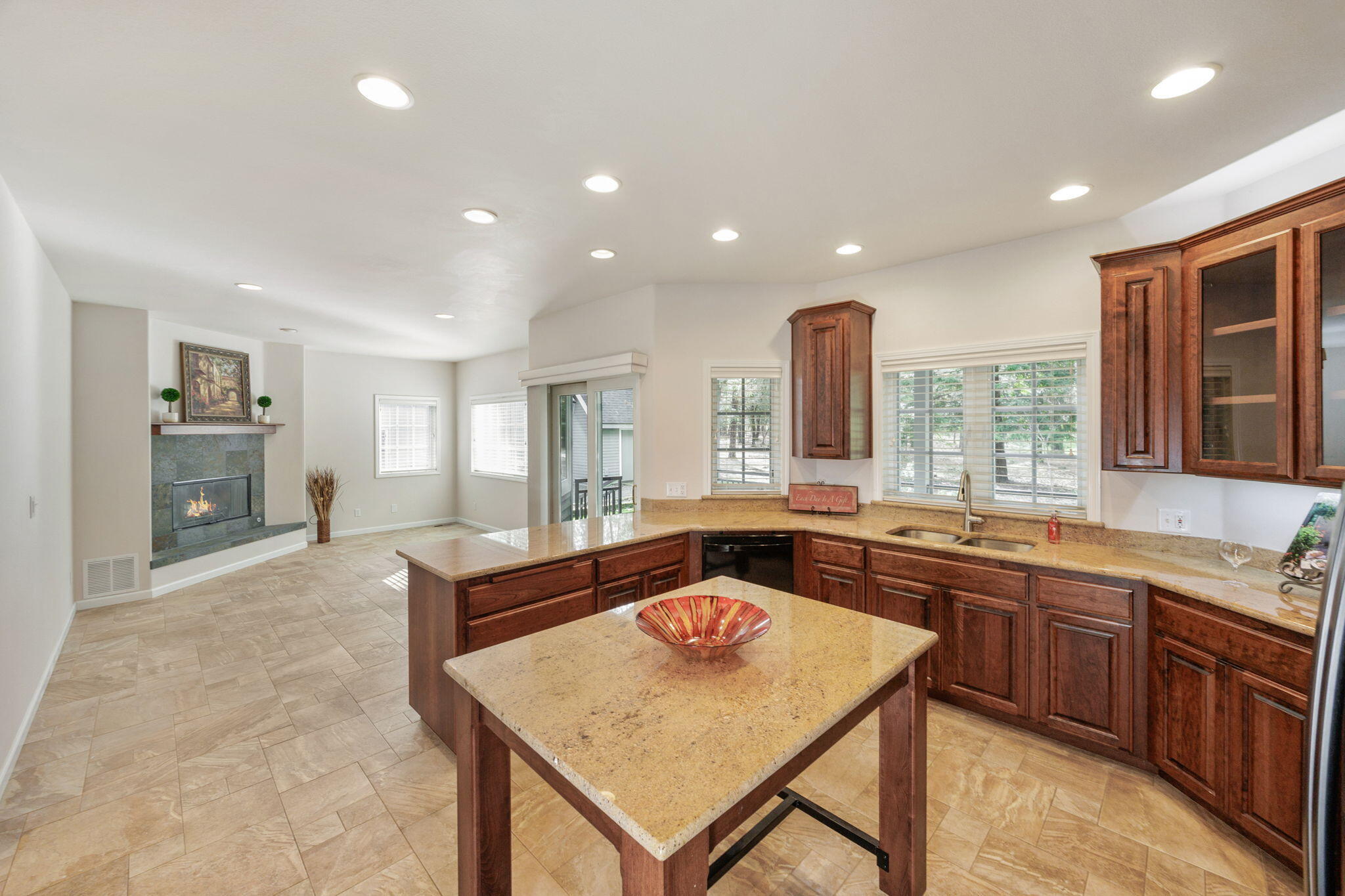 7081 Redthorne Road Rogue River, OR 97537 - Photo 26 of 58 a dining hall with stainless steel appliances granite countertop a sink and a refrigerator