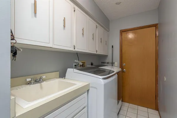 $499,900 | 2830 Valencia Lane West, Palm Harbor, FL 34684