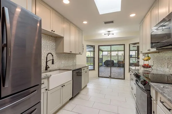 $499,900 | 2830 Valencia Lane West, Palm Harbor, FL 34684