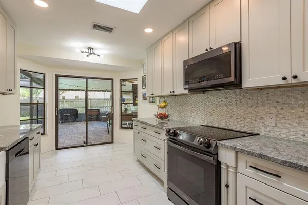 $499,900 | 2830 Valencia Lane West, Palm Harbor, FL 34684