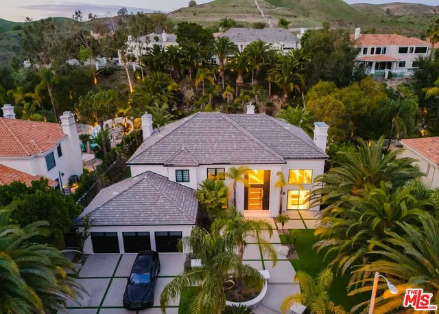 a view of outdoor space with garden and seating area