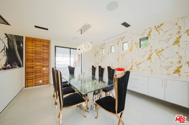 a spacious bathroom with a tub and shower