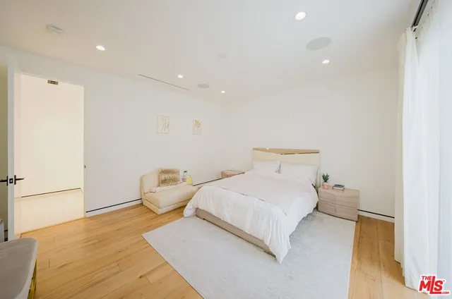 a view of a backyard with sitting area