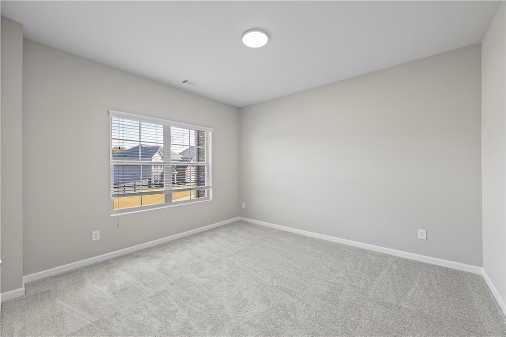 30 Fanleaf Drive Fairburn, GA 30213 - Photo 31 of 88 an empty room with a window