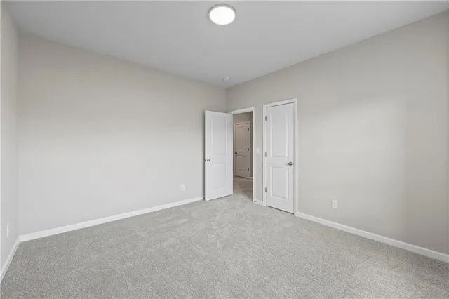 a bathroom with a toilet and bathtub