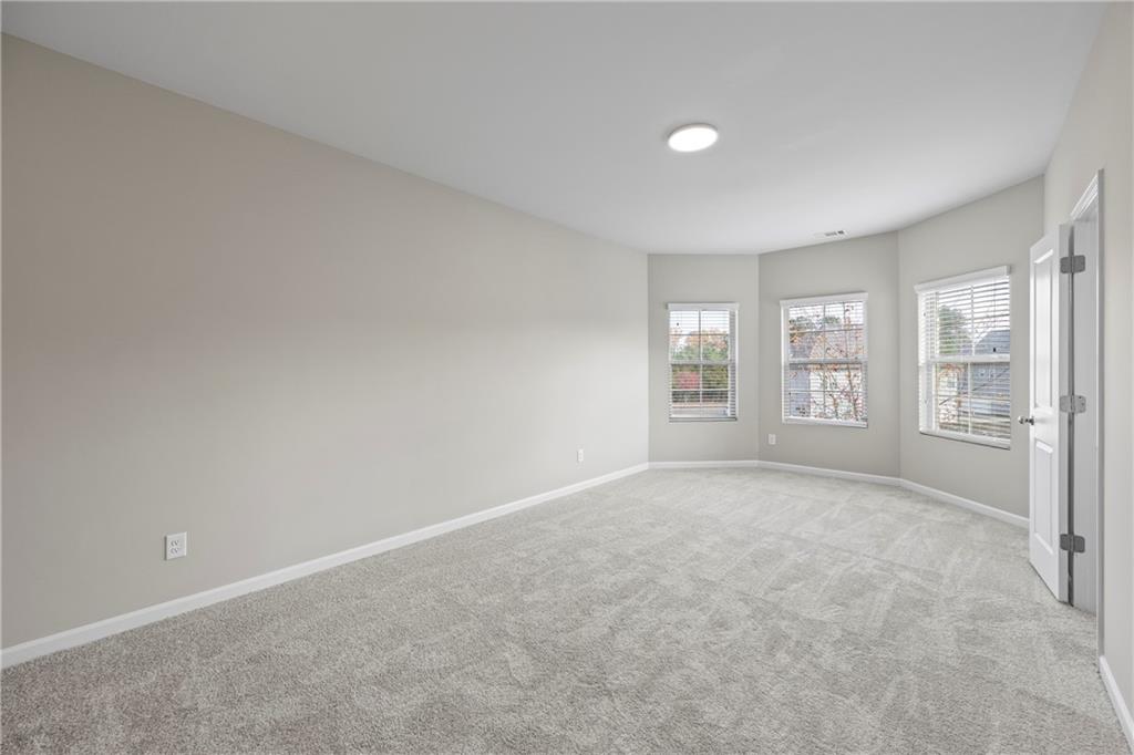 30 Fanleaf Drive Fairburn, GA 30213 - Photo 33 of 88 a view of an empty room with a window
