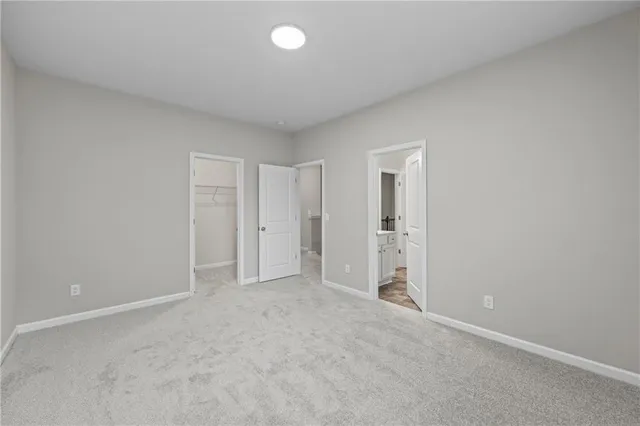 a view of a room with window and closet area