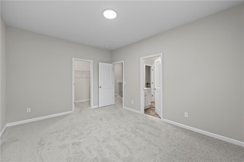 30 Fanleaf Drive Fairburn, GA 30213 - Photo 40 of 88 an empty room with closet area