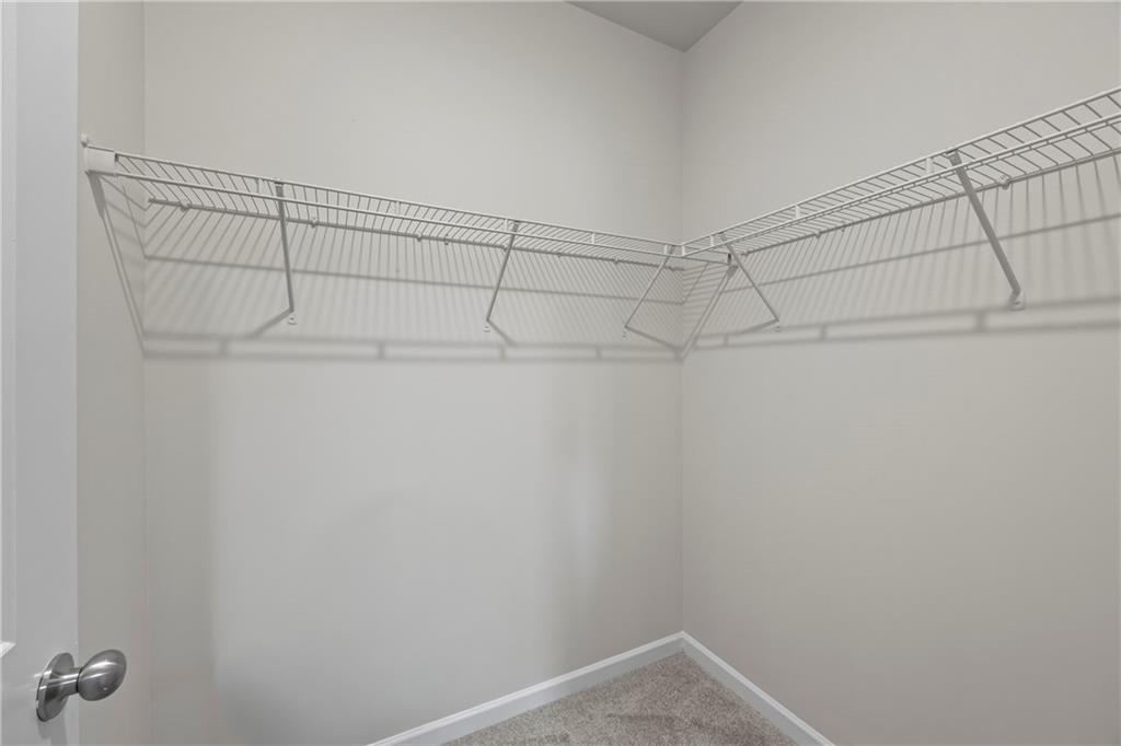 30 Fanleaf Drive Fairburn, GA 30213 - Photo 41 of 88 a view of a room with racks on the wall