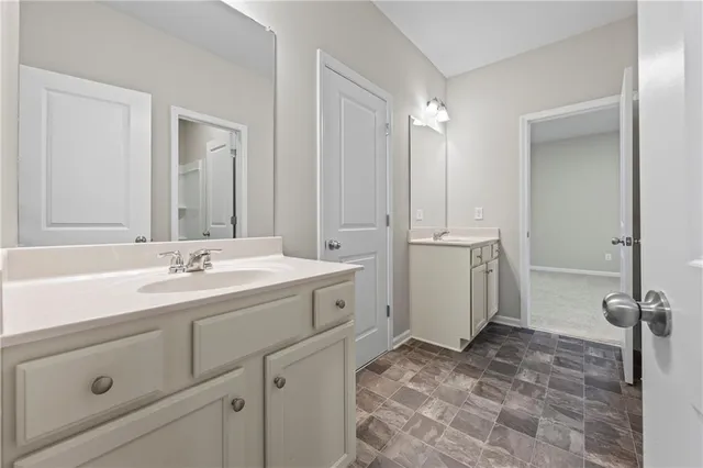 a view of a house with a door and a window