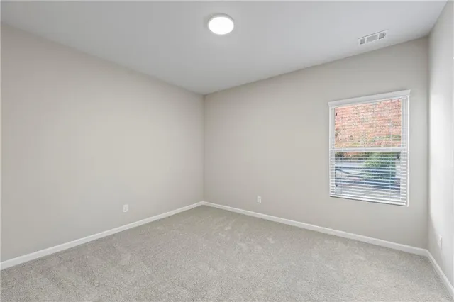 a view of swimming pool with outdoor seating