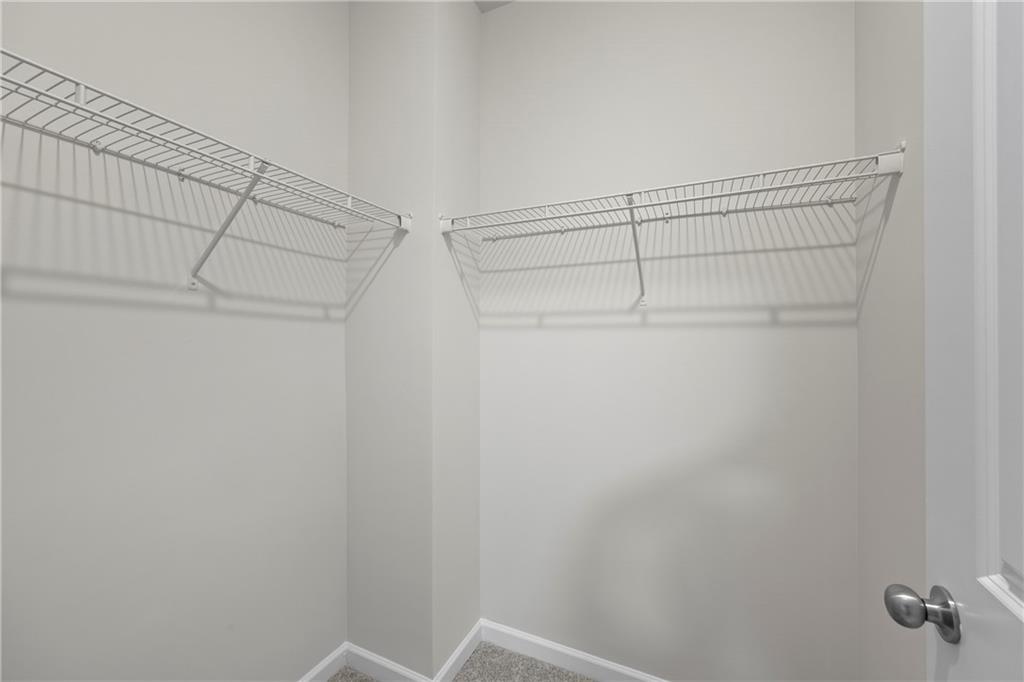 30 Fanleaf Drive Fairburn, GA 30213 - Photo 49 of 88 a view of a room with racks on the wall