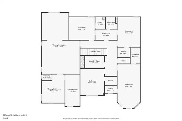 a view of an empty room and wooden floor