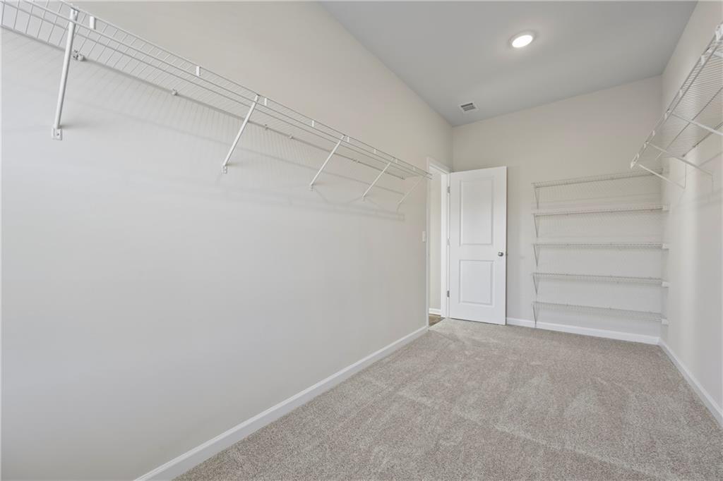 30 Fanleaf Drive Fairburn, GA 30213 - Photo 61 of 88 a view of an empty walk in closet