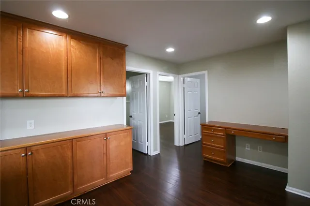 a hallway with wooden floor