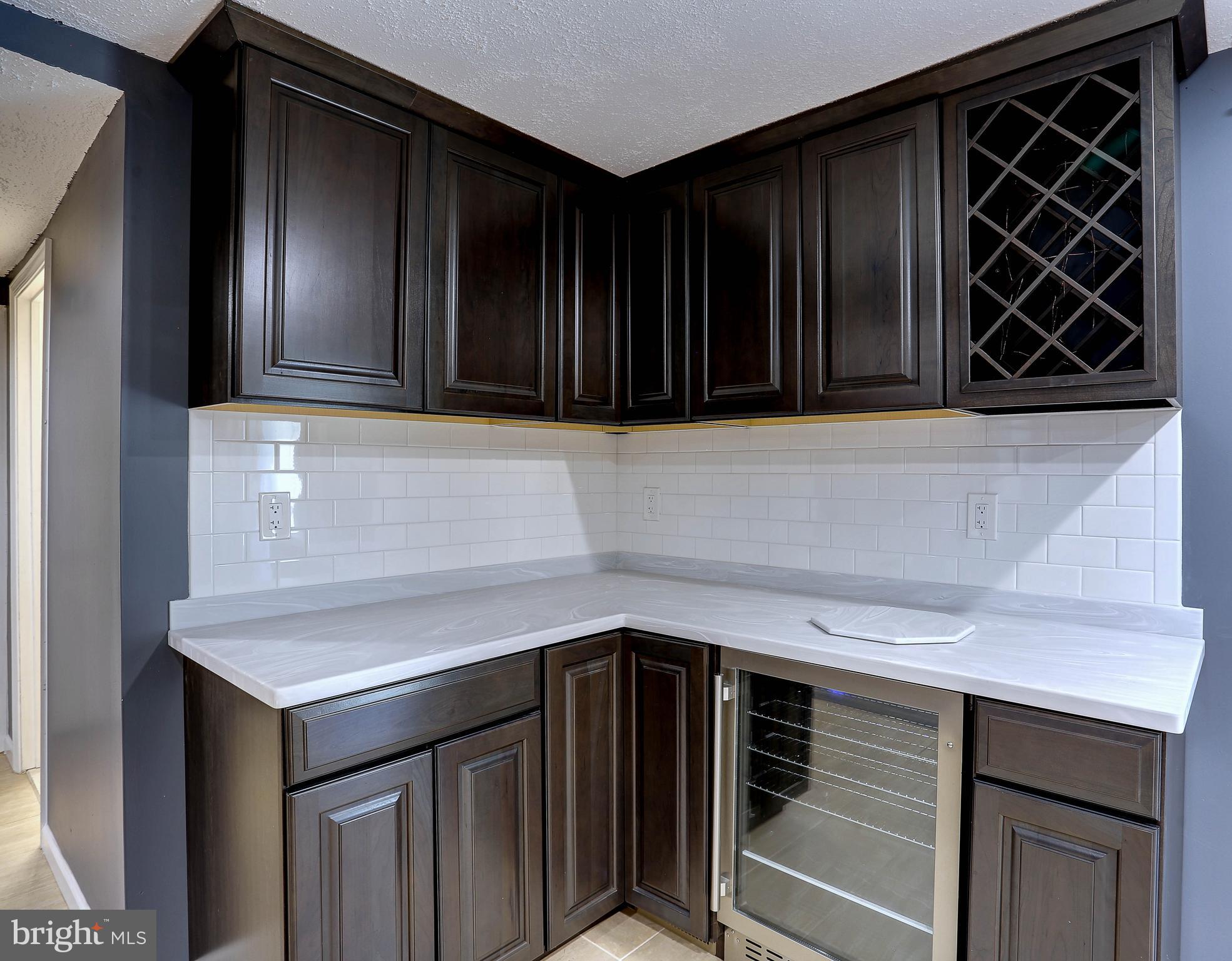 117 Circle Road Pasadena, MD 21122 - Photo 28 of 46 Lower Level Bar w/Refrigerator