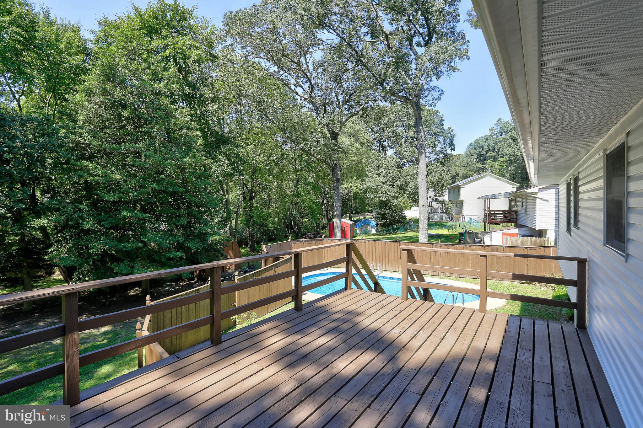 117 Circle Road Pasadena, MD 21122 - Photo 32 of 46 Deck off Dining Room