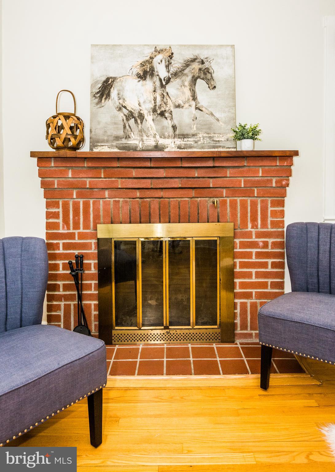 8513 High Ridge Road Ellicott City, MD 21043 - Photo 14 of 43 Wood burning fireplace to warm your winters.