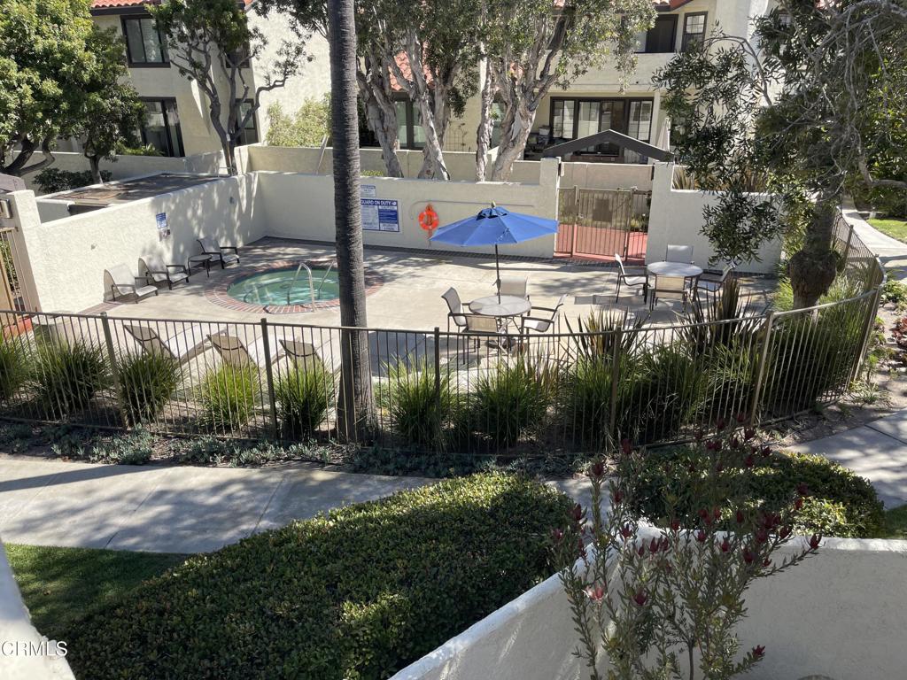 2240 Cannes Square Oxnard, CA 93035 - Photo 54 of 75 a backyard of a house with lots of green space and plants