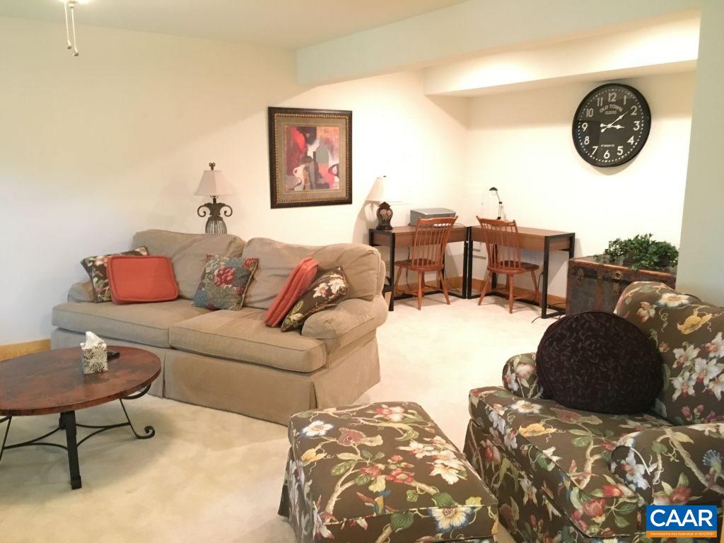 280 Fawn Ridge Drive Roseland, VA 22967 - Photo 14 of 19 a living room with furniture and a table
