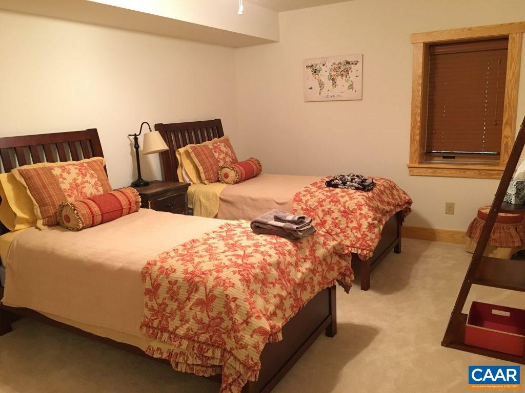 280 Fawn Ridge Drive Roseland, VA 22967 - Photo 15 of 19 a bedroom with two beds and painting on the wall