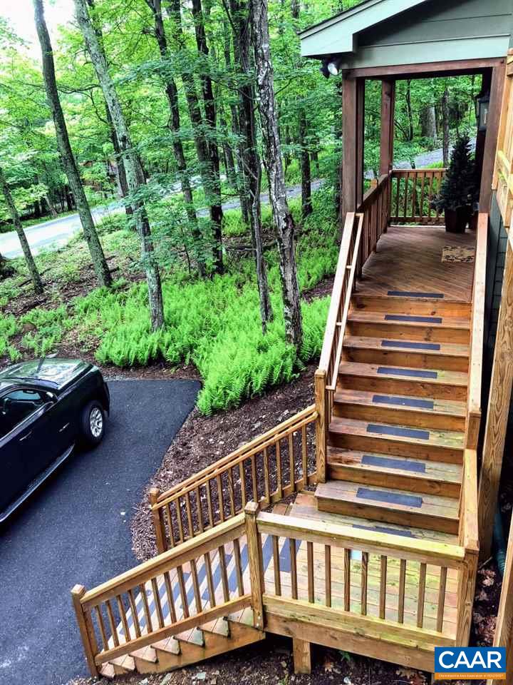 280 Fawn Ridge Drive Roseland, VA 22967 - Photo 3 of 19 a view of a wooden deck with a yard