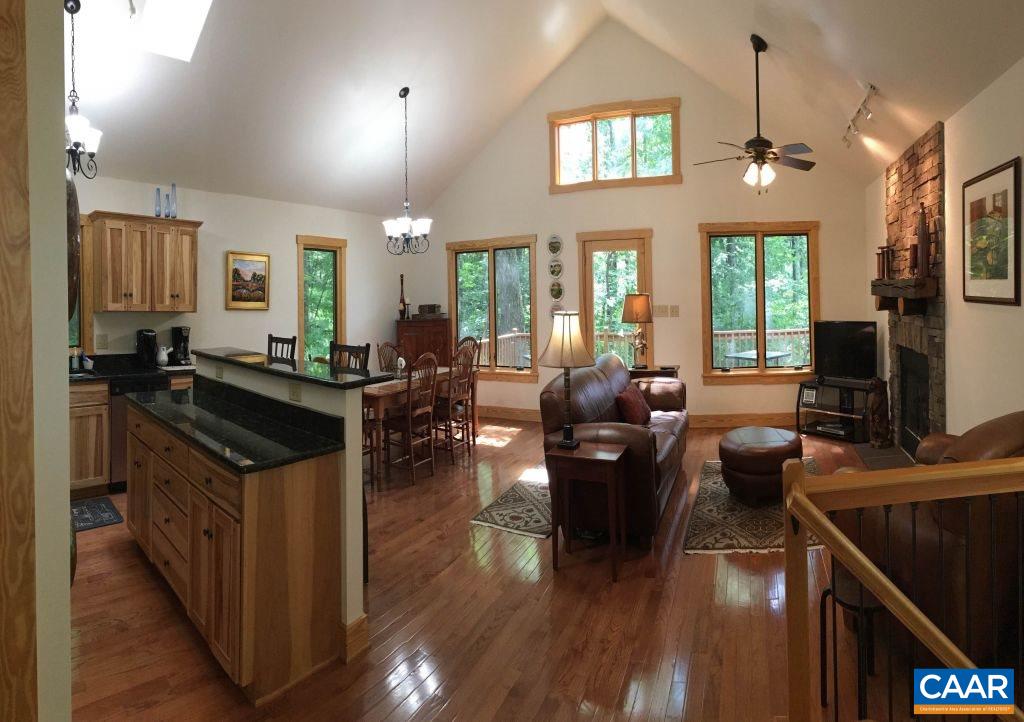 280 Fawn Ridge Drive Roseland, VA 22967 - Photo 9 of 19 a kitchen with stainless steel appliances granite countertop a stove and a living room