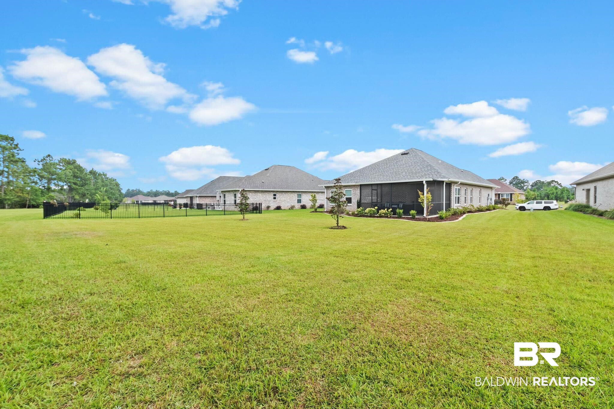 9815 Lakeview Drive Foley, AL 36535 - Photo 78 of 100 View of yard with a sunroom