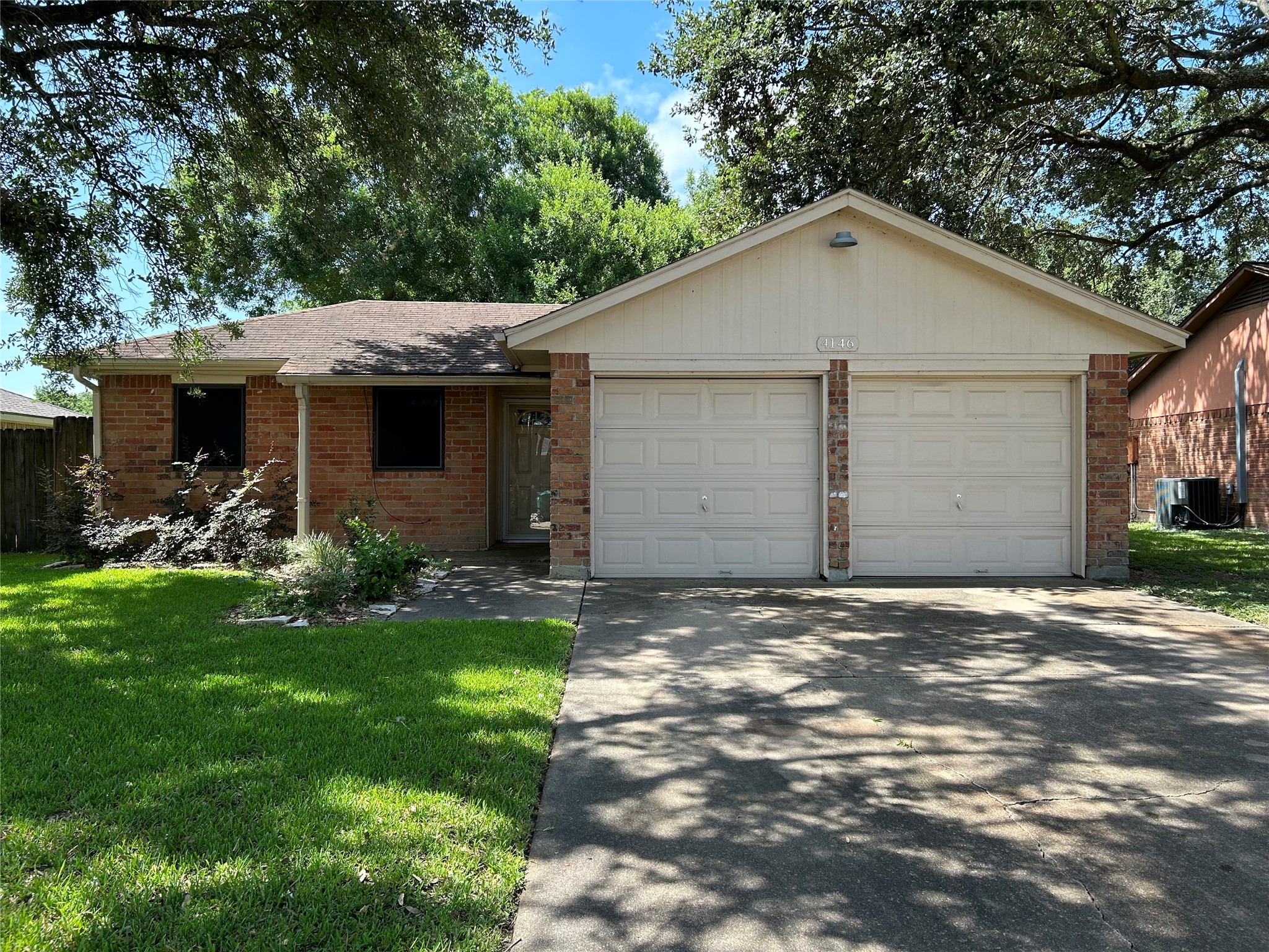 4146 Bermuda Drive Pasadena, TX 77503 - Photo 2 of 16 a front view of house with yard and green space