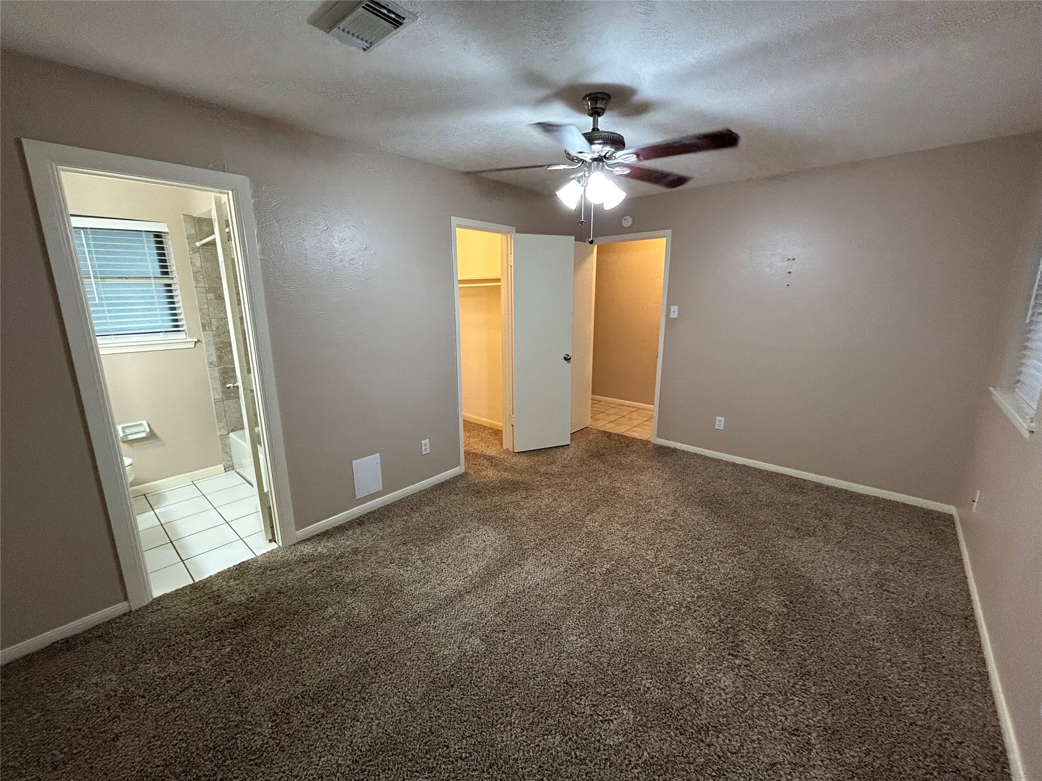 4146 Bermuda Drive Pasadena, TX 77503 - Photo 10 of 16 a view of an empty room with a chandelier fan