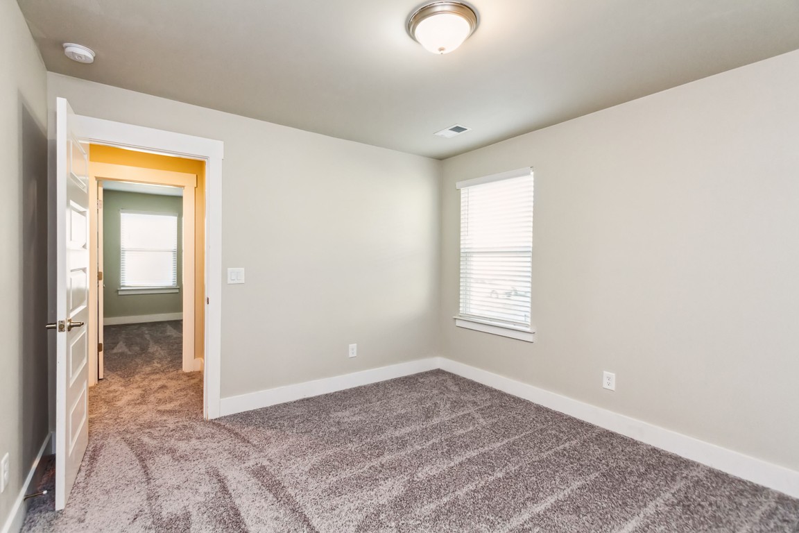 3261 Longstalk Road Antioch, TN 37013 - Photo 17 of 46 an empty room with windows and closet